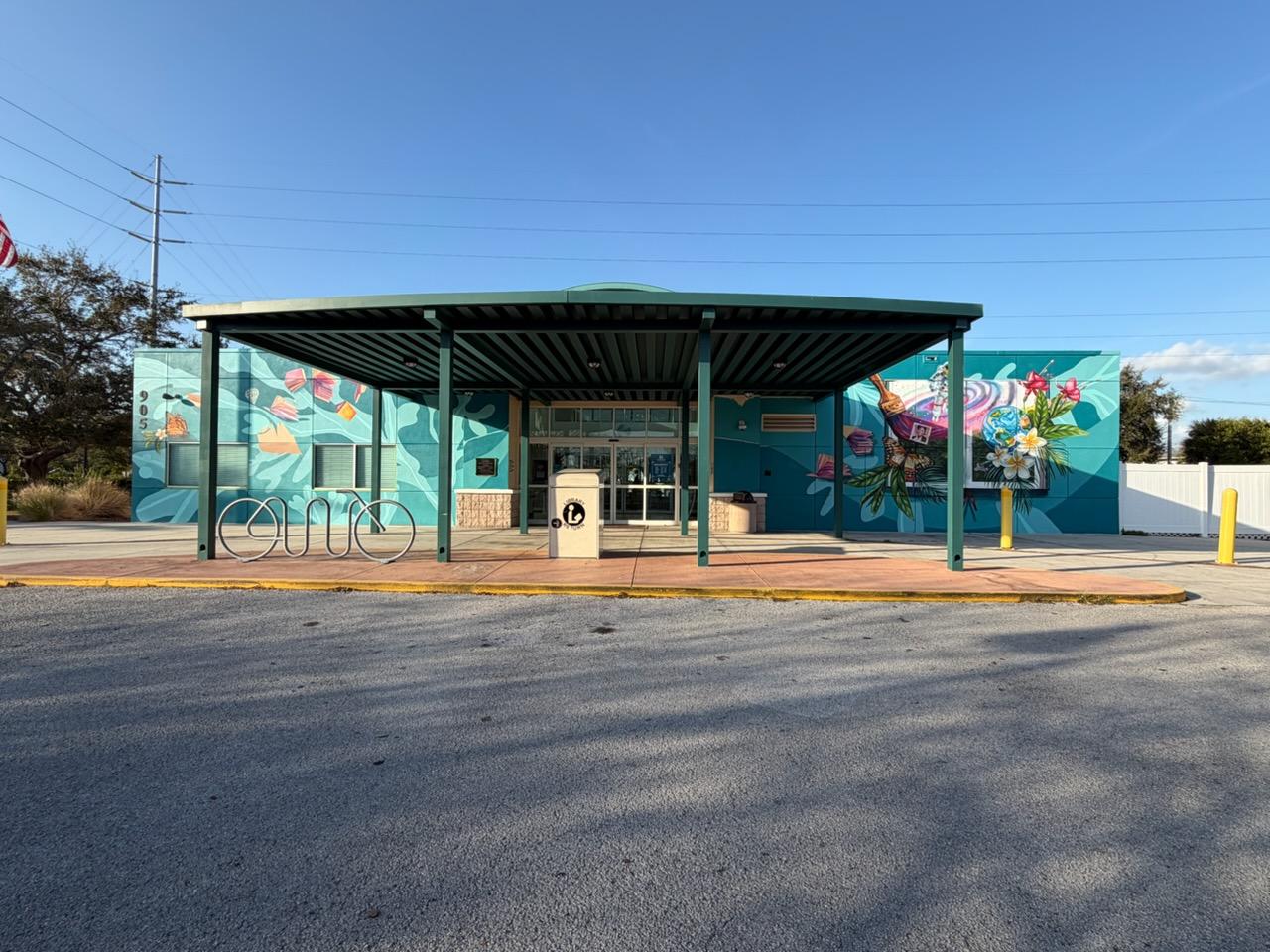 Entrance to the Clearwater library with exterior mural.