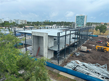 New Clearwater city hall under construction showing framework and early concrete walls.