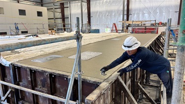 worker overlaying on float