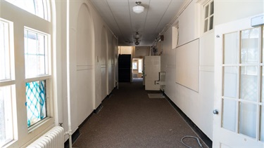 building hallway with white walls