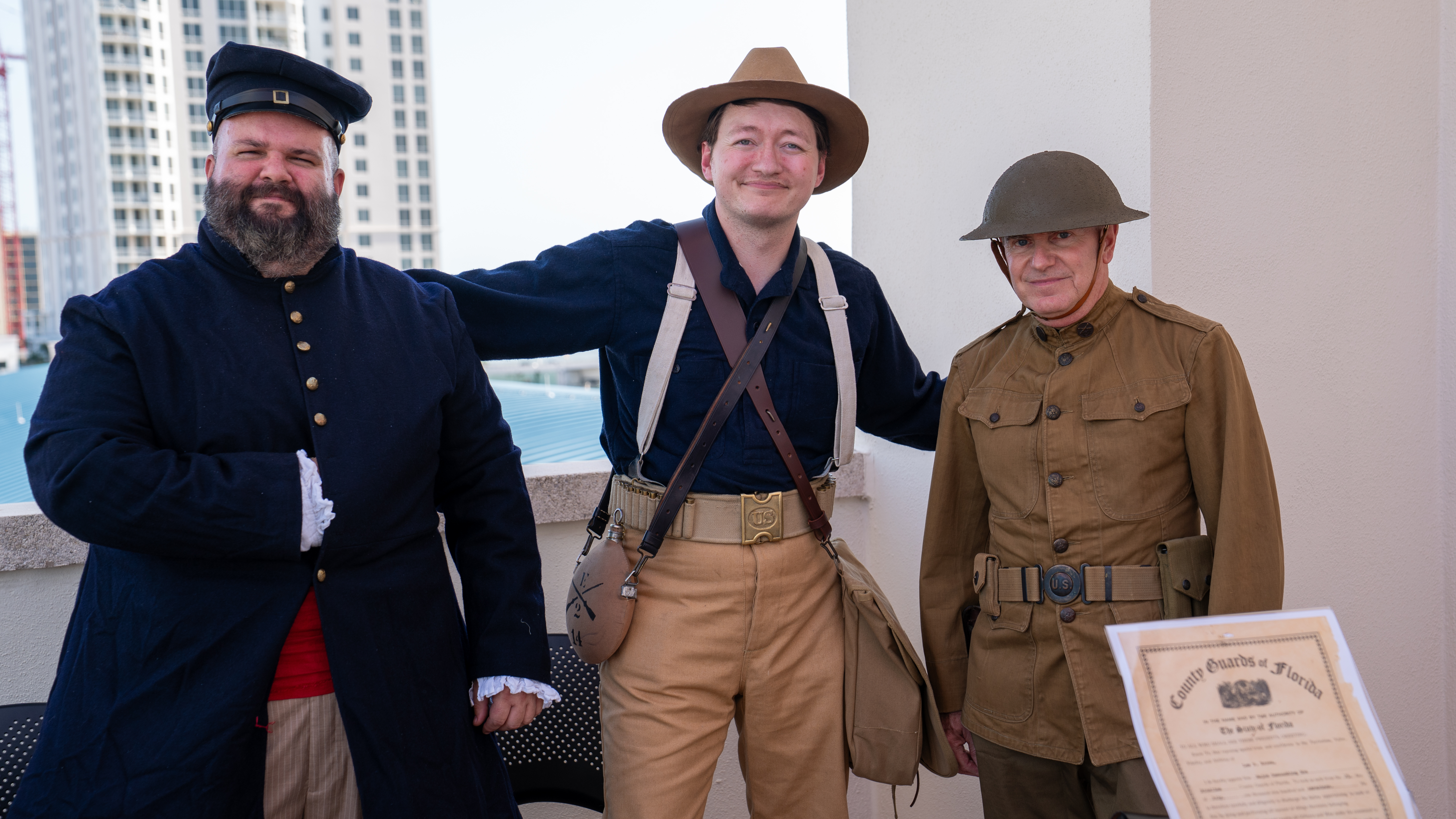 Librarians in American military uniforms from different wars