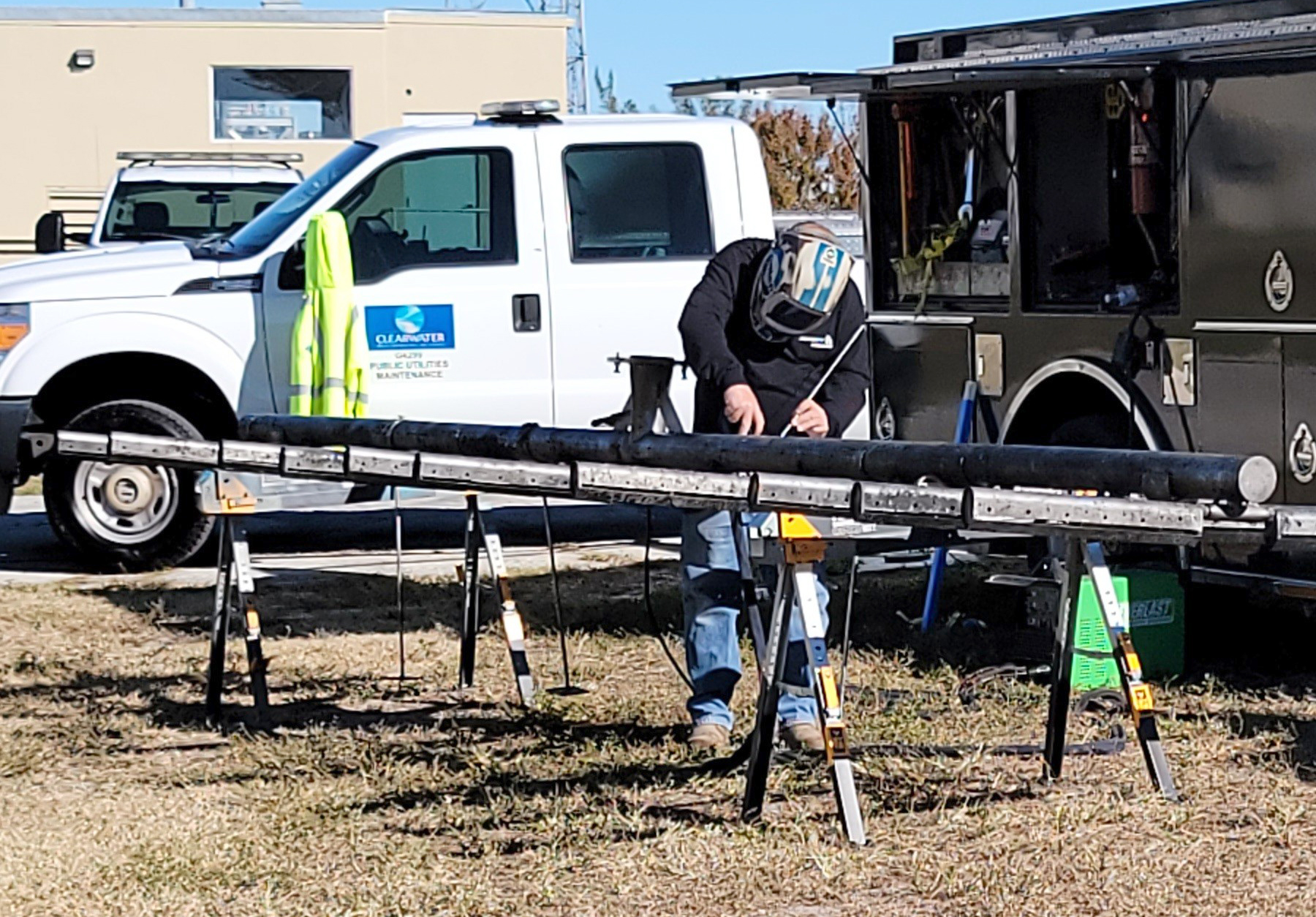 A welder works at the Northeast Wastewater Plant to refurbish diffuser assemblies