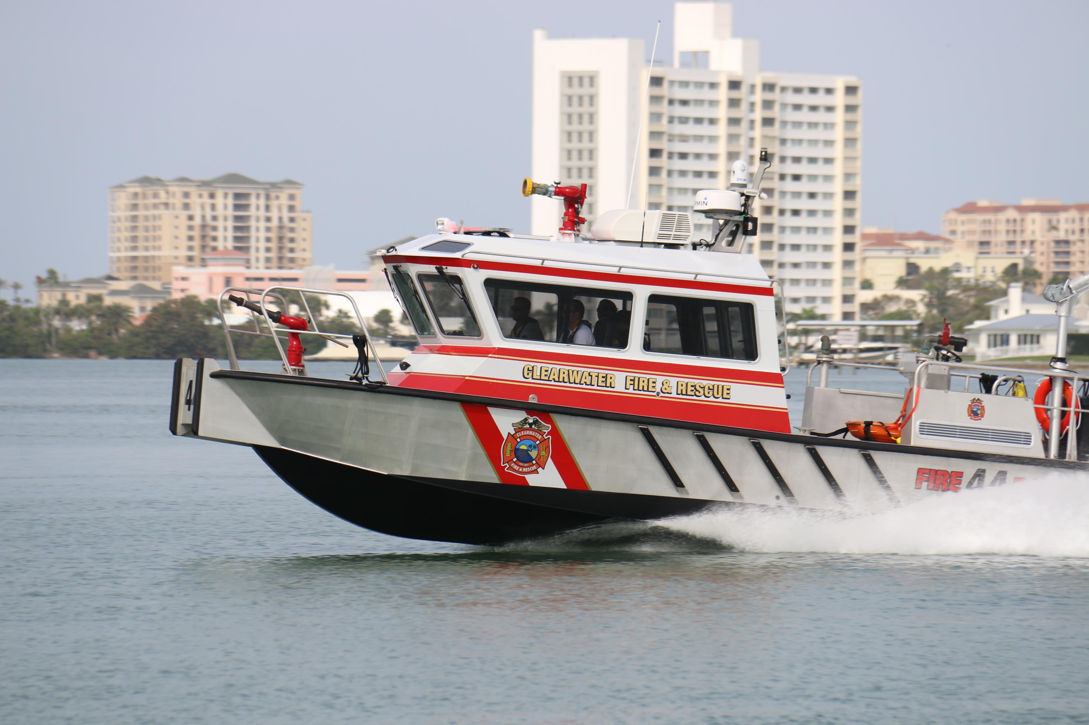 fire boat going through the water