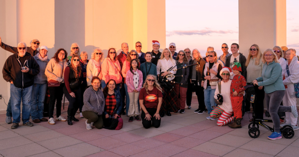 Patrons Enjoying the Sunset on the Roof Program