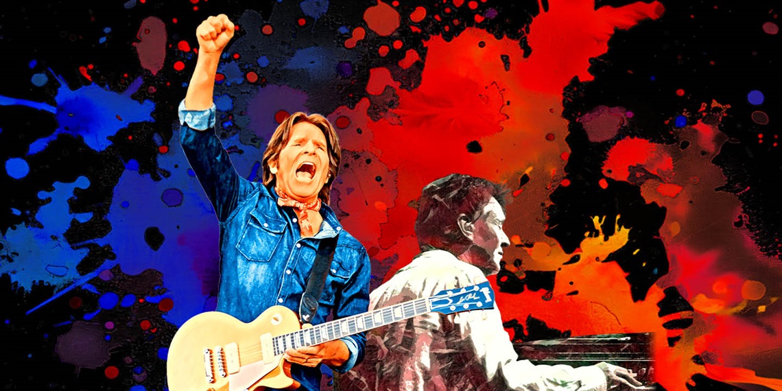 Two men on stage, one with a guitar the other with keyboards.