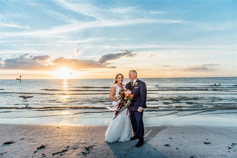 A couple getting married on the beach