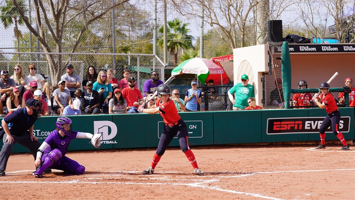 Girl playing softball